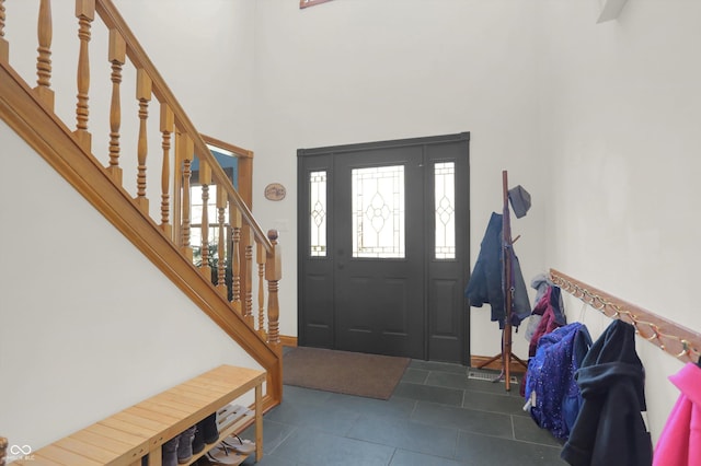 545 Walnut Woods Dr, Greenwood, IN 46142 - tiled entrance foyer featuring a high ceiling and stairway