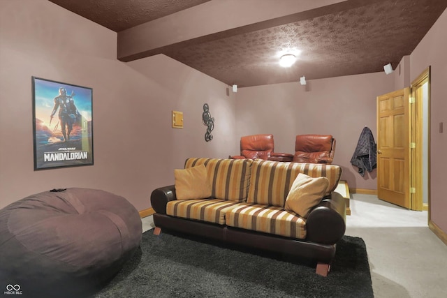 545 Walnut Woods Dr, Greenwood, IN 46142 - cinema with a textured ceiling, light carpet, baseboards, and beamed ceiling