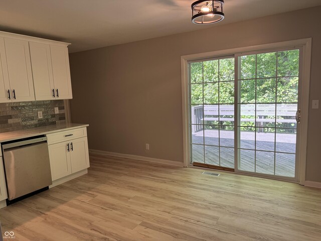 10328 Central Ave, Carmel, IN 46280 - kitchen with dishwasher, baseboards, backsplash, and light wood-type flooring