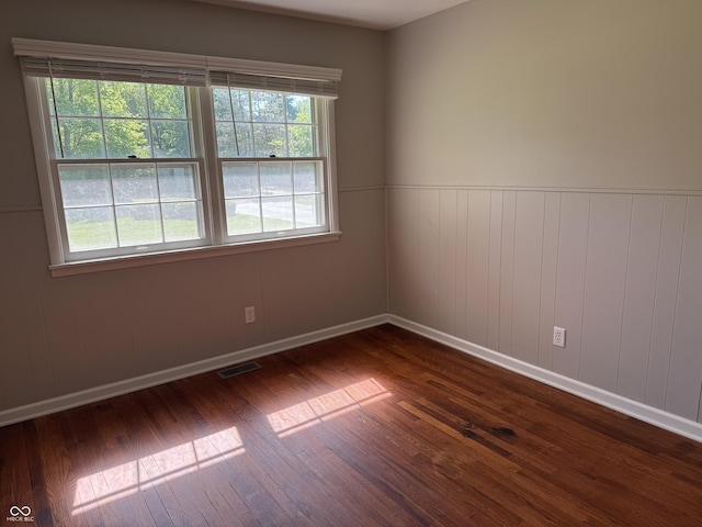 10328 Central Ave, Carmel, IN 46280 - spare room with dark wood finished floors and baseboards