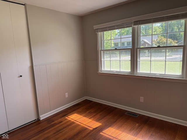 10328 Central Ave, Carmel, IN 46280 - spare room with dark wood finished floors and baseboards