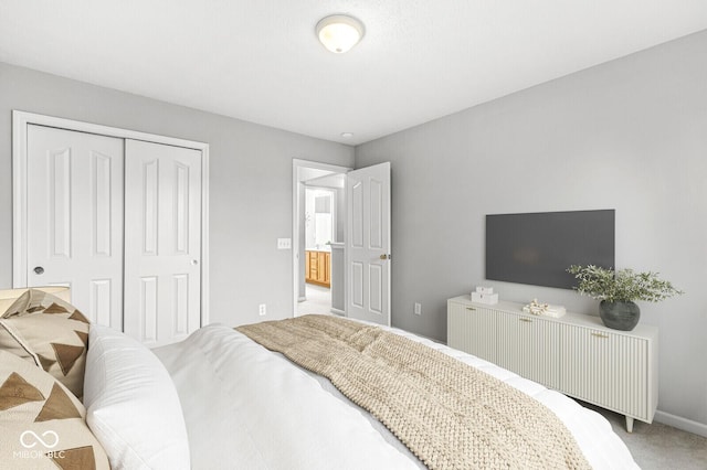 14353 Chariots Whisper Dr, Carmel, IN 46074 - carpeted bedroom with a closet and baseboards