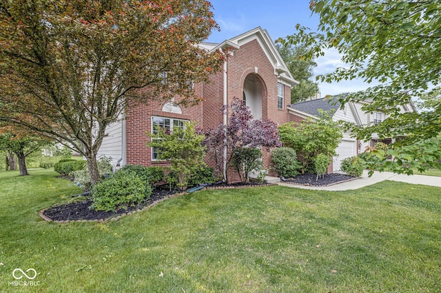 14353 Chariots Whisper Dr, Carmel, IN 46074 - view of front facade with brick siding and a front lawn