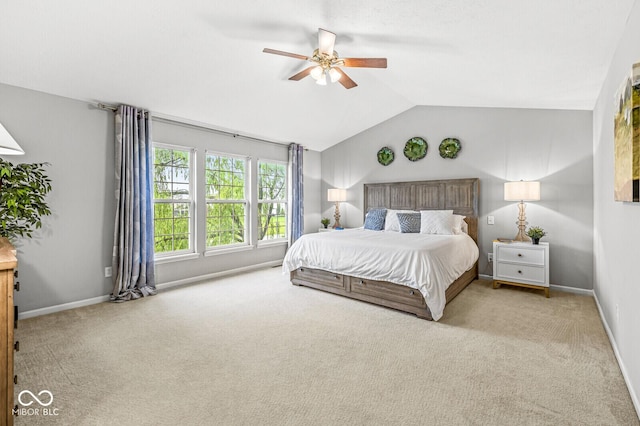 14353 Chariots Whisper Dr, Carmel, IN 46074 - carpeted bedroom with lofted ceiling, ceiling fan, and baseboards
