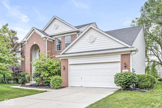 14353 Chariots Whisper Dr, Carmel, IN 46074 - traditional home featuring brick siding, driveway, a garage, and a front lawn
