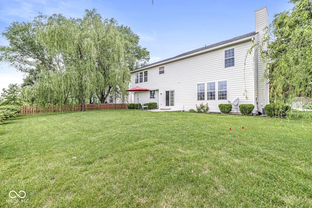 14353 Chariots Whisper Dr, Carmel, IN 46074 - back of property with a chimney