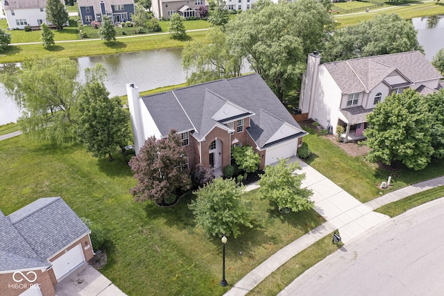 14353 Chariots Whisper Dr, Carmel, IN 46074 - aerial view of residential area featuring a large body of water