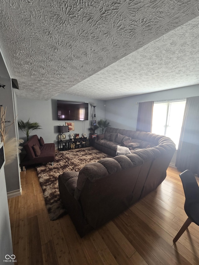 2248 Salem Park Dr, Indianapolis, IN 46239 - living area featuring a textured ceiling and hardwood / wood-style flooring