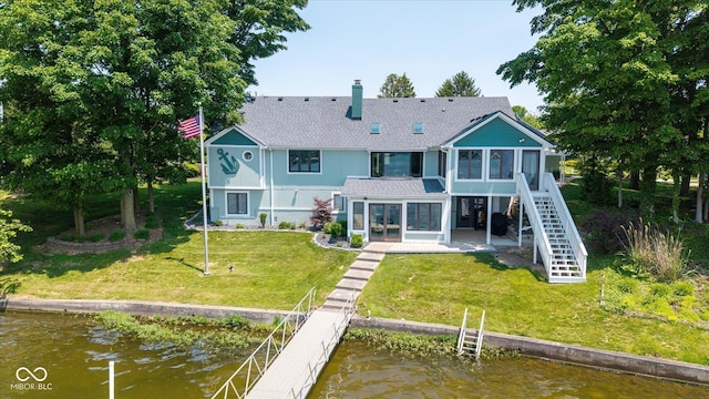 101 Edgewater Dr, Noblesville, IN 46062 - rear view of property with stairway, a sunroom, a water view, a shingled roof, and a chimney