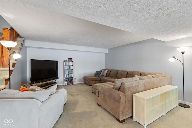101 Edgewater Dr, Noblesville, IN 46062 - living room featuring light colored carpet, a textured ceiling, and baseboards