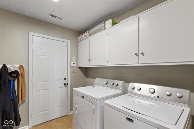 101 Edgewater Dr, Noblesville, IN 46062 - washroom with cabinet space, separate washer and dryer, and light tile patterned floors