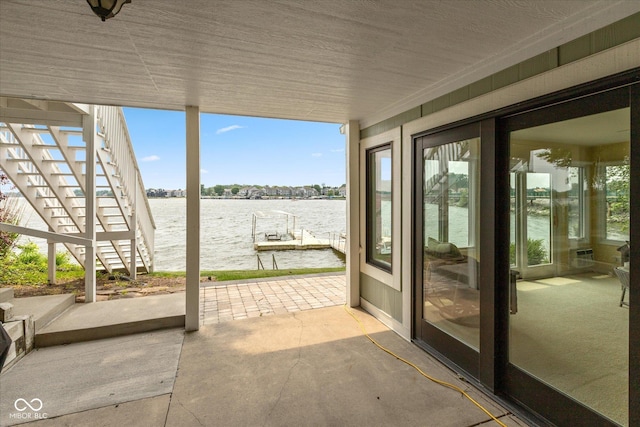 101 Edgewater Dr, Noblesville, IN 46062 - view of patio / terrace with stairway, a water view, and a dock