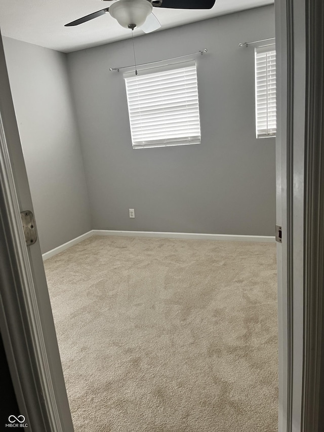 842 Westpointe Dr, Shelbyville, IN 46176 - unfurnished room featuring ceiling fan, carpet flooring, plenty of natural light, and baseboards