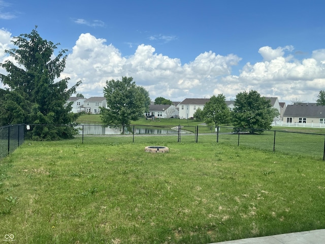 842 Westpointe Dr, Shelbyville, IN 46176 - view of yard with a residential view, a fire pit, and a water view