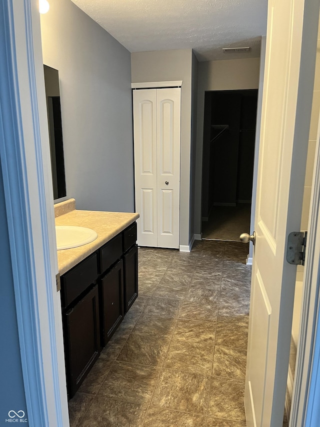 842 Westpointe Dr, Shelbyville, IN 46176 - bathroom with vanity and a textured ceiling