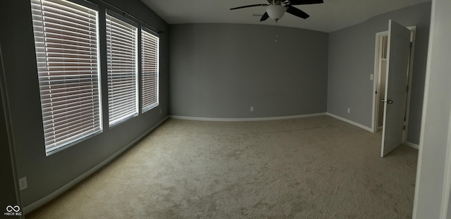 842 Westpointe Dr, Shelbyville, IN 46176 - unfurnished bedroom with carpet flooring, baseboards, ceiling fan, and vaulted ceiling