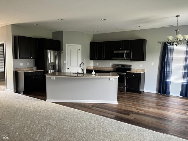 842 Westpointe Dr, Shelbyville, IN 46176 - kitchen featuring stainless steel appliances, a sink, dark cabinetry, baseboards, and recessed lighting