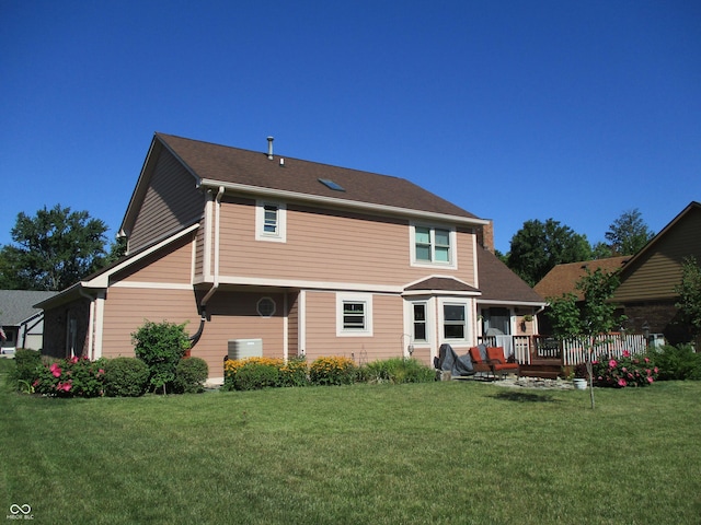 8331 Tequista Ct, Indianapolis, IN 46236 - rear view of house featuring a lawn and a wooden deck