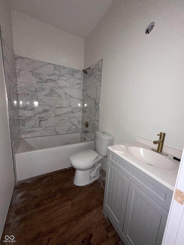 830 Villa Ave, Indianapolis, IN 46203 - full bath with toilet, wood finished floors, tub / shower combination, and vanity