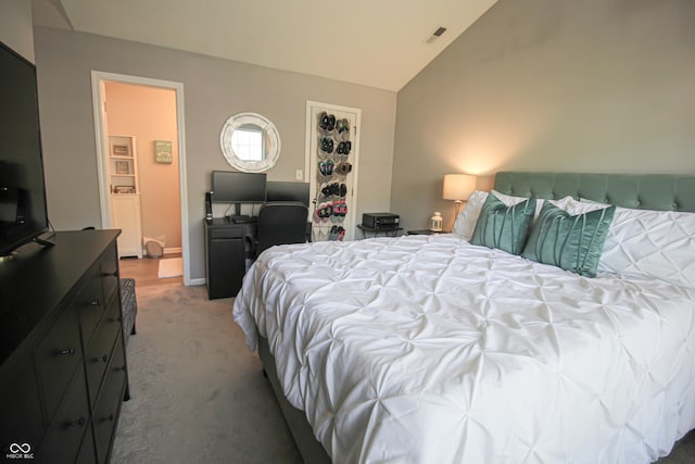 9774 Foxboro Ln, Fishers, IN 46038 - bedroom with lofted ceiling and light carpet