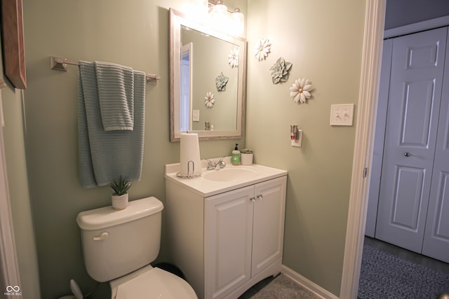 9774 Foxboro Ln, Fishers, IN 46038 - half bathroom with toilet, vanity, and baseboards