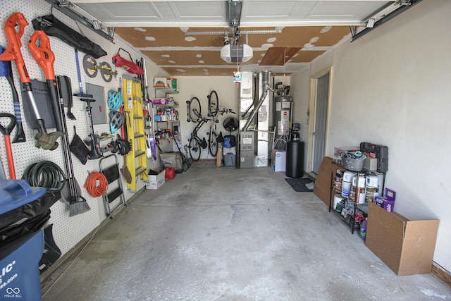 9774 Foxboro Ln, Fishers, IN 46038 - garage featuring a garage door opener, water heater, and heating unit