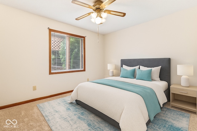7426 N Carroll Rd, Indianapolis, IN 46236 - carpeted bedroom featuring baseboards and a ceiling fan