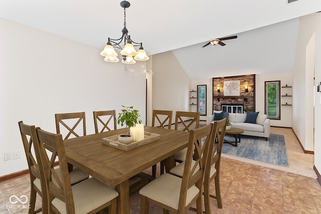 7426 N Carroll Rd, Indianapolis, IN 46236 - dining space with a chandelier, vaulted ceiling, and ceiling fan