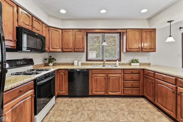 7426 N Carroll Rd, Indianapolis, IN 46236 - kitchen featuring black appliances, brown cabinetry, hanging light fixtures, and light stone countertops