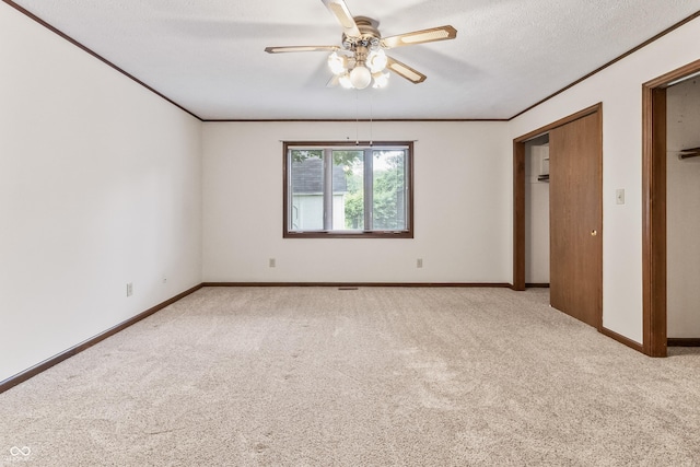 7426 N Carroll Rd, Indianapolis, IN 46236 - unfurnished bedroom featuring light carpet, crown molding, and ceiling fan