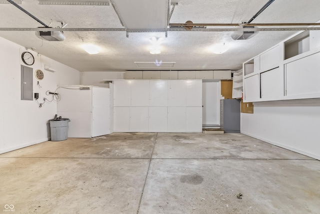7426 N Carroll Rd, Indianapolis, IN 46236 - garage featuring electric panel and a garage door opener