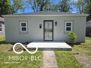 2421 N Arsenal Ave, Indianapolis, IN 46218 - view of front of property featuring concrete block siding