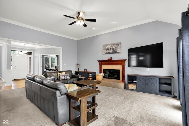 14492 Allison Dr, Carmel, IN 46033 - living area featuring ceiling fan, crown molding, and a tile fireplace