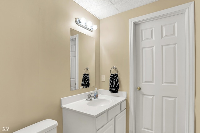 14492 Allison Dr, Carmel, IN 46033 - half bath with vanity, toilet, and a drop ceiling