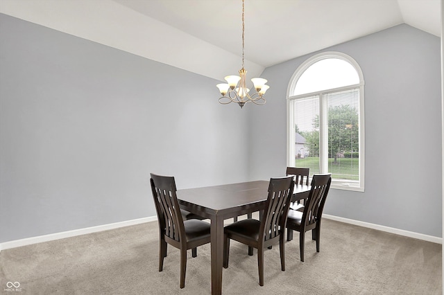 14492 Allison Dr, Carmel, IN 46033 - dining room with vaulted ceiling, a chandelier, light colored carpet, and baseboards