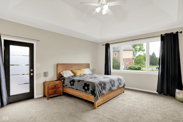 14492 Allison Dr, Carmel, IN 46033 - carpeted bedroom with a tray ceiling, baseboards, and a ceiling fan