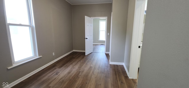 709 N Sterling Ave, Veedersburg, IN 47987 - unfurnished room with dark wood-style flooring and baseboards