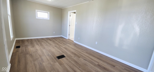 709 N Sterling Ave, Veedersburg, IN 47987 - unfurnished room featuring wood finished floors and baseboards