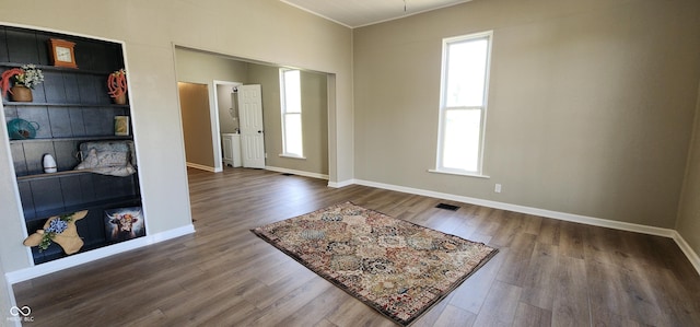 709 N Sterling Ave, Veedersburg, IN 47987 - entryway featuring plenty of natural light, wood finished floors, baseboards, and crown molding