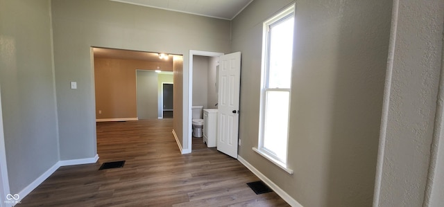 709 N Sterling Ave, Veedersburg, IN 47987 - hall featuring wood finished floors, baseboards, and crown molding