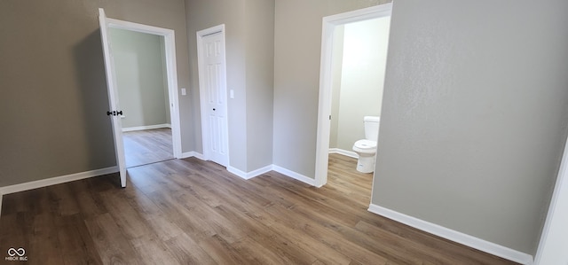 709 N Sterling Ave, Veedersburg, IN 47987 - hallway featuring wood finished floors and baseboards