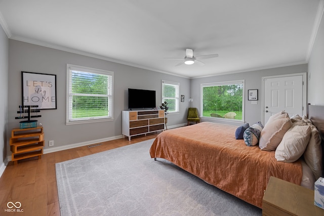 3503 S 9th St, Lafayette, IN 47909 - bedroom featuring crown molding, wood finished floors, baseboards, and ceiling fan