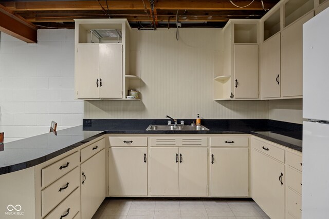 3503 S 9th St, Lafayette, IN 47909 - kitchen featuring open shelves, a sink, freestanding refrigerator, and dark countertops