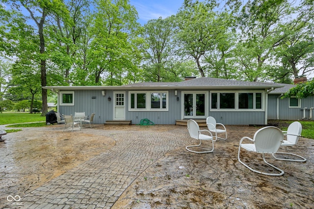 3503 S 9th St, Lafayette, IN 47909 - rear view of house with french doors, a patio area, a chimney, and roof with shingles