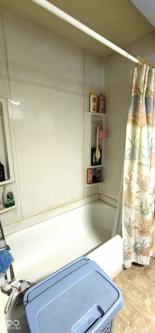 1619 Crest Ct, Indianapolis, IN 46214 - bathroom featuring shower / tub combo with curtain