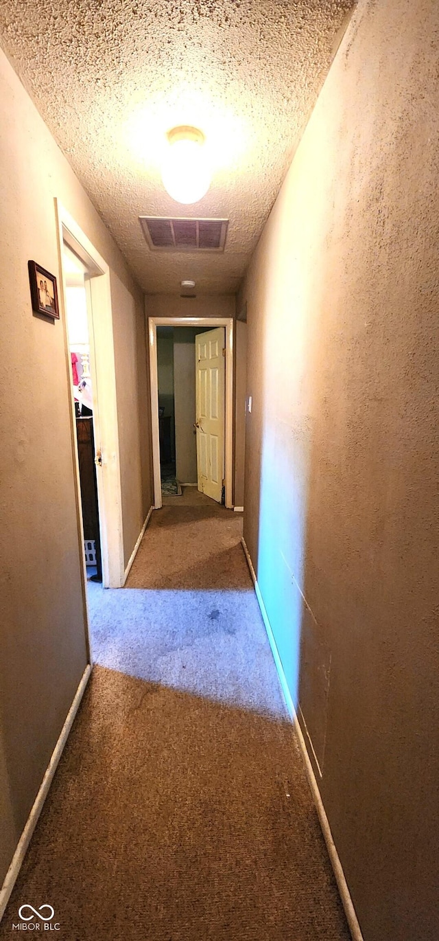 1619 Crest Ct, Indianapolis, IN 46214 - hall featuring carpet and a textured ceiling