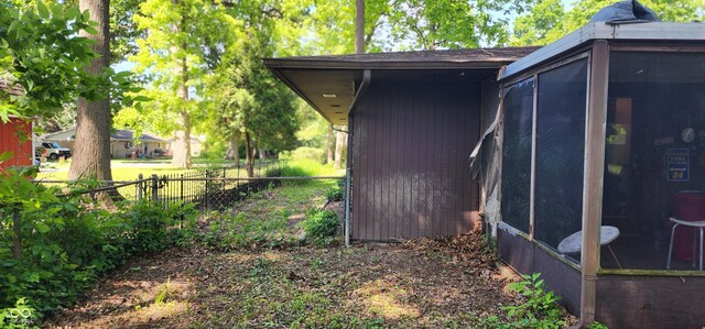 1619 Crest Ct, Indianapolis, IN 46214 - view of side of property with a sunroom