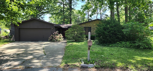 1619 Crest Ct, Indianapolis, IN 46214 - ranch-style house with concrete driveway, a garage, stone siding, and a front yard
