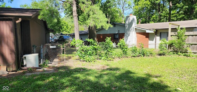 1619 Crest Ct, Indianapolis, IN 46214 - view of yard with a gate