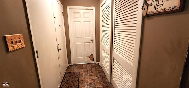 1619 Crest Ct, Indianapolis, IN 46214 - hall featuring stone finish flooring and baseboards
